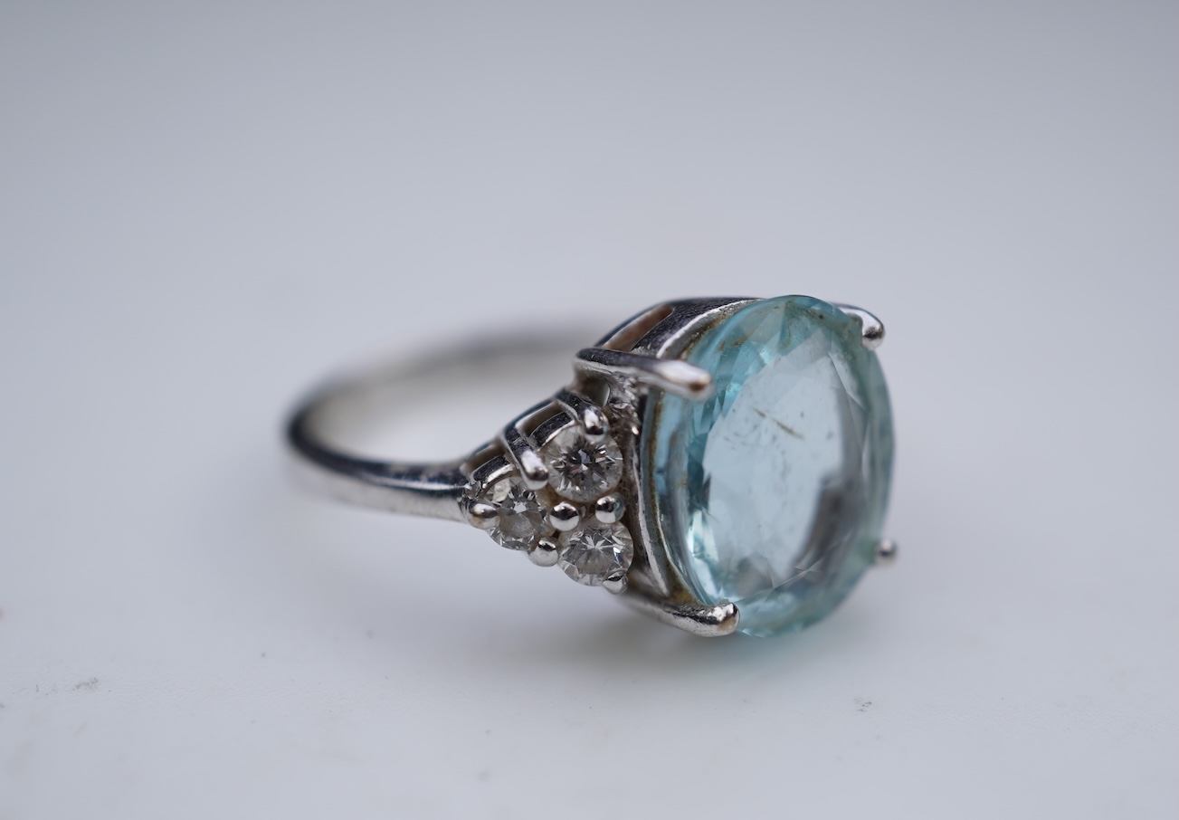 An aquamarine and diamond ring